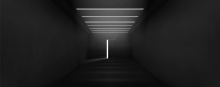 Dark corridor with evenly spaced ceiling lights leading to a partially open door emitting bright light, symbolizing a threshold.